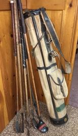 Great antique wooden clubs and golf bag