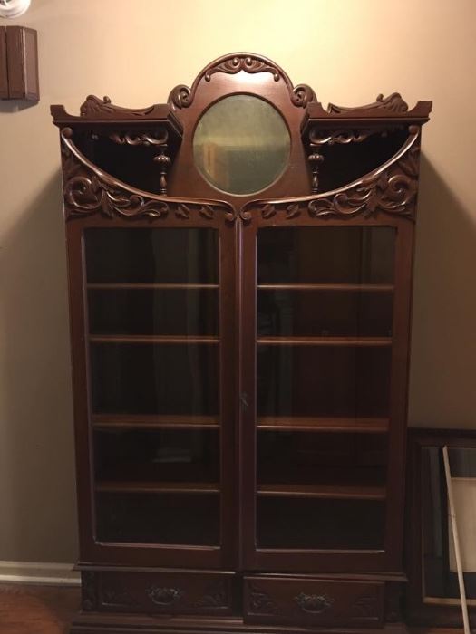 Gorgeous Carved Mahogany Curio
46" Wide
