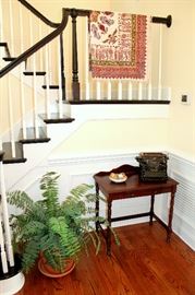 Silk fern, vintage writing desk, Persian tablecloth