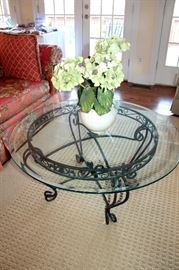 Glass-top iron coffee table