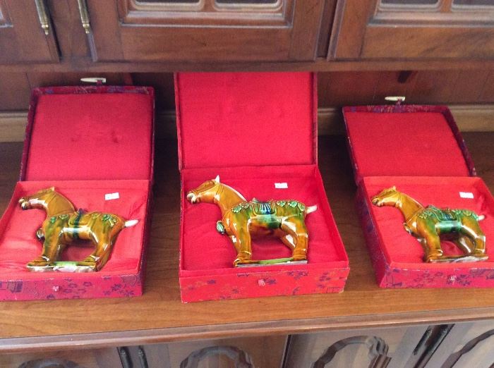 Oriental porcelain glazed horses in fitted boxes
