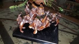 Four Fighting Foo Dogs in bronze. Foo Fighters!!