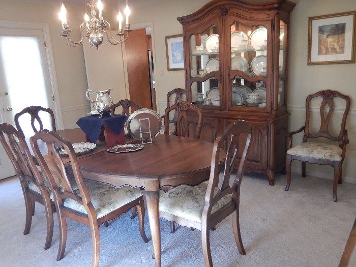 Dining Table with extra leaf plus 8 chairs and a China Cabinet