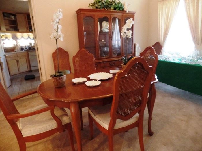 Dining room set with two leaves and eight chairs, sold separately