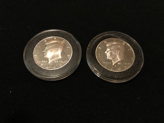 Lot of 2 2003-S JFK Half Dollar pieces.