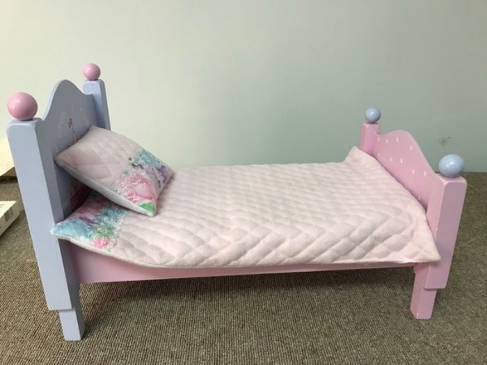 Once upon a Time doll bed with blanket and pillow.