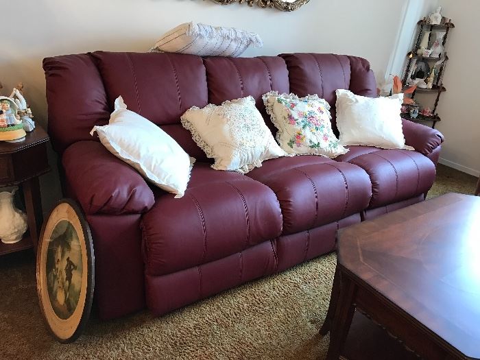 Wine colored leather reclining Sofa