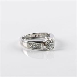 14K Gold Round Brilliant Diamond Ring: A 14K white gold and round brilliant cut diamond ring.
