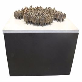 William Hodd McElcheran "8:45 A.M." Bronze Sculpture: A solid bronze sculpture titled 8:45 A.M. by Canadian designer and sculptor, William Hodd McElcheran (1927–1999). McElcheran is best known for crafting a variety of large and small figural sculptures, often military related. This sculpture features a total of fourteen various sized bronze pieces ranging from single figures to large clusters of figures that are mounted into the stone top via screws to the underside of each piece. The grey stone top then rests on a large wooden pedestal with a black finish.