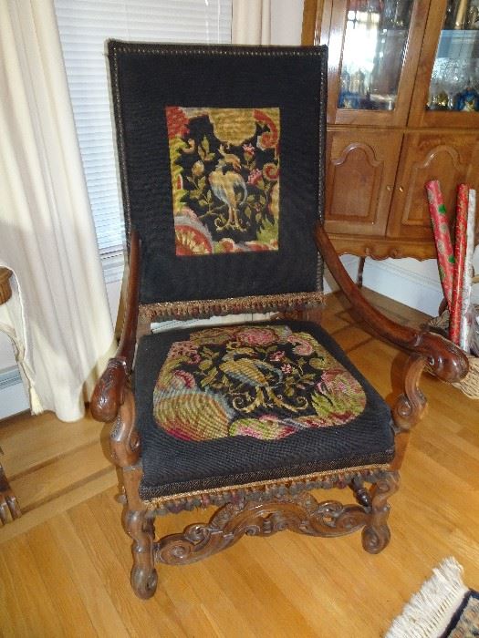 Pair of Carved Antique Throne Chairs with Embellished Needlepoint Tapetries