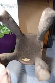 This impressive and superb wooden shoulder mask comes from the Baga people.  This is a classical example that displays many traditional components such as the spherical head, the plaited hair with medial crest, a large noses and pendulous breasts which hang close to the body,  its four legs, and geometric patterns decorating the hairstyle and the breast . This mask depicts a bust of a woman on four legs. Such mask is known as a D'mba headdress, that is by far the most well known Baga work of art. Its use was documented as early as 1886.  It represents an older woman who has given selflessly, and also represents community. It is worn on the head with a costume of raffia and cloth.

The Nimba masks, often monumental works carried on the shoulders, rank among the largest of all ritual objects in West Africa. Their use, as hinted at above, is rather ubiquitous. They are used at funerals, harvest festivals, and at initiations. Normally these "masks" have four legs or posts (for placement on