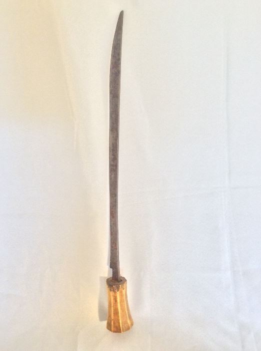 Primitive steel blade sword with bone handle. 24" length. 