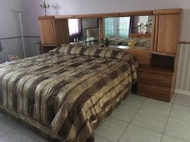 King bed lots of hiding space in this headboard !