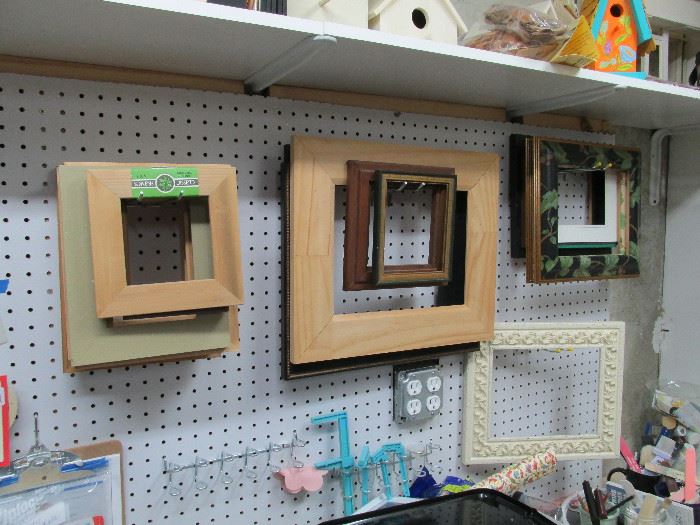 Dozens of frames and unfinished wood crafts