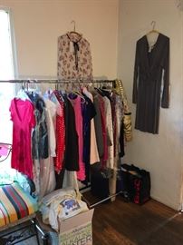 Clothing from suits to T shirts. Many new with tags or dry-cleaned