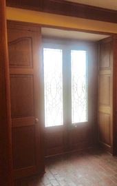 Leaded glass French doors, cypress closets