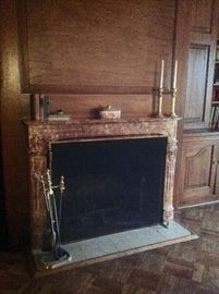 Carved marble fireplace mantle, fireplace tools, andirons and firescreen 