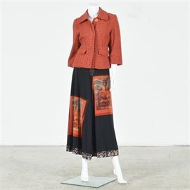 Women's Bohemian Mixed Media Skirt with Coordinating Boucle Jacket: A pair of women’s bohemian mixed media skirt with coordinating boucle wool jacket. The jacket is a red and orange tweed in a medium size. The skirt is long with a slit in front. Fabric is slinky black with a palette of color in front. The waist is blue jean style with ribbon accent trim, which also accents the cuff of the skirt.