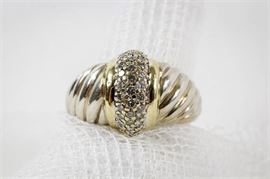 David Yurman Sterling and 18K Yellow Gold Diamond Ring: A David Yurman sterling and 18K yellow gold diamond cluster ring. This ring features an 18K yellow gold band with a cluster of prong-set diamonds in a wide sterling silver fluted shank.