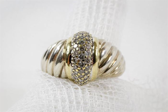 David Yurman Sterling and 18K Yellow Gold Diamond Ring: A David Yurman sterling and 18K yellow gold diamond cluster ring. This ring features an 18K yellow gold band with a cluster of prong-set diamonds in a wide sterling silver fluted shank.