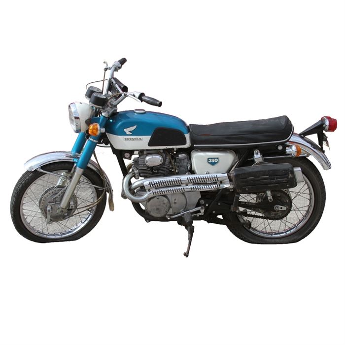 1968 Honda CB350 Scrambler Motorcycle: A 1968 Honda CB350 Scrambler Motorcycle. This Honda Scrambler features a 325cc, 33 HP four-stroke OHC parallel twin cylinder engine with two CV/constant velocity carburetors, dual exhaust, shielded crossover pipes, and five speed transmission. It features a speedometer and tachometer, front and rear directionals, a round head lamp, a candy blue with white tank color scheme, chrome with blue forks, chrome fenders, oval tail light, and smooth surface black tone upholstered seat. VIN: CB350-1008193. Odometer reads 00064.5 miles.