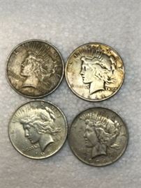Four Peace Silver Dollar Coins