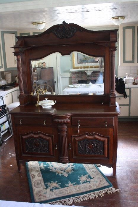 Probably THE SINGLE most beautiful piece of furntiture I have ever had at a sale.  Mirror is beveled.  Perhaps one of two minor scrapes.  I don't know age.  OH, it has a secret compartment. Photo does not do it justice.