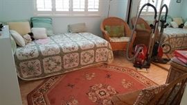 Twin bed with memory foam mattress on base with two storage drawers. Comes with linens as shown.