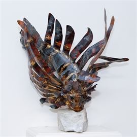 Painted Metal Lionfish Sculpture: A marvelous, painted metal sculpture of a lionfish nibbling at a quartz stone plinth. The sculpture does not appear to be signed but provenance reveals the piece was acquired in 1993 from the Glen Heln Art Show held in Yellow Springs, and that the artist was an Ohioan.