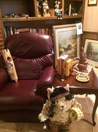 Leather chair; end table; kachina dolls; G Harvey art