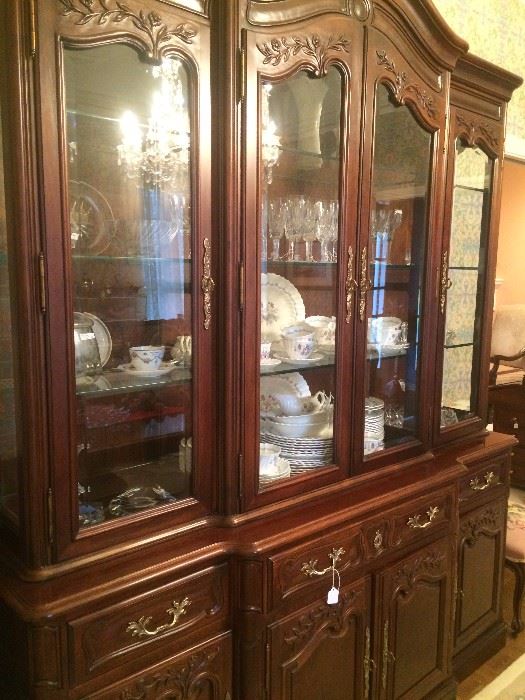 Gorgeous china cabinet has matching dining table and server.