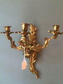 One of two matching wall sconces