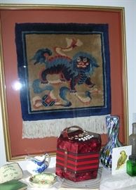 Concertina. Chinese rug, framed