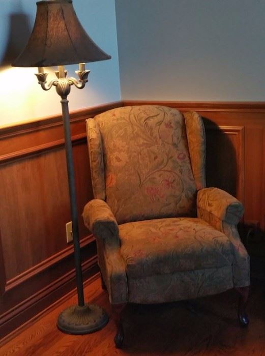 Another comfortable chair with warm colors. Floor lamp