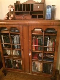 Antique book case with old books (inside) and organizer (above)