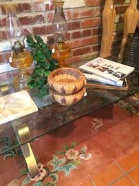 Glass top coffee table; vintage oil lamps