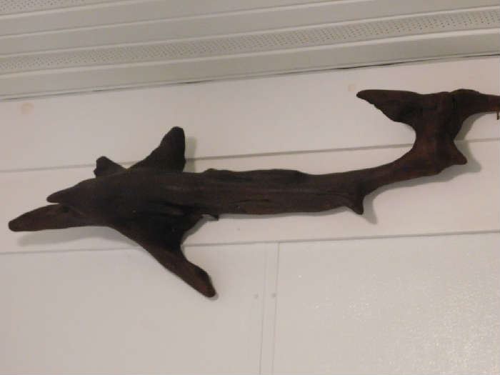 drift wood shaped like a shark