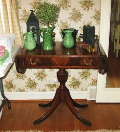 drop side table and nice pottery pieces