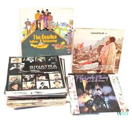 Collection of Vintage Records: A collection of vintage records. Features artists include Elton John, William B. Williams, Johnathan Edwards, Frank Sinatra, The Beatles, Neil Young, Donna Summer, Linda Ronstadt, Quincy Jones, Louis Armstrong, Billy Joel, Genesis, Chicago, Jethro Tull, ZZ Top, The Supremes, The Commodores, Dean Martin, Prince, George Harrison, an assortment of broadway albums, and much more. Approximately 100 records in all.
