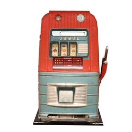Jewel Ten Cent Slot Machine: A vintage Jewel slot machine. This 10 cent machine features oak casing to sides, a blue and red exterior, and colorful reel. Key not included.