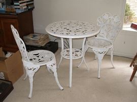 2 cast iron chairs, aluminum patio table