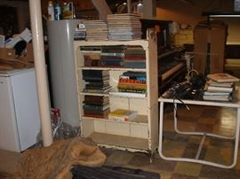 bookcase, home repair books, outdoor table
