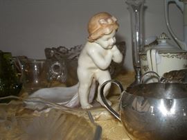 antique figurine marked