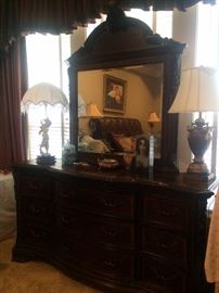 The mirrored dresser completes the king bedroom set.