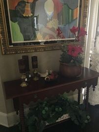 Another 2-tiered entry/sofa table; framed art by Itzchak Tarkay