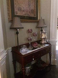 Entry/sofa table (2 tiers); stunning glassware; matching lamps; silver plate coffee server