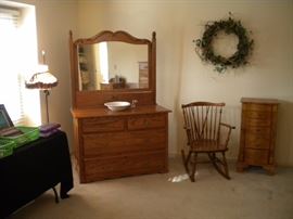 Oak dresser and mirror, wooden rocker, jewelry amoire