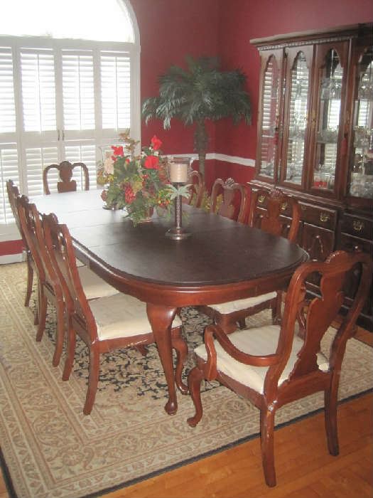 Broyhill dining table/8 chairs (2 host chairs) with custom table pads; dining room rug approx. 10'9" x7' 9"