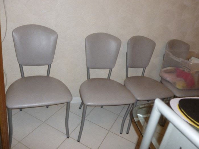 Set of 4 gray leather chairs