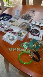 many nice pieces of costume jewelry